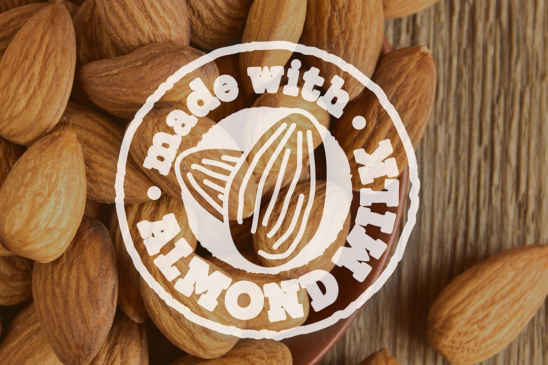 Et bord med mandler med Made with Almond Milk-logo